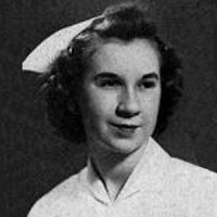 Lisa Izard Dark-haired young woman in a nurse's uniform